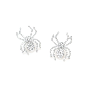 Macro shot of silver alloy spider earrings with sparkling white rhinestone embellishments