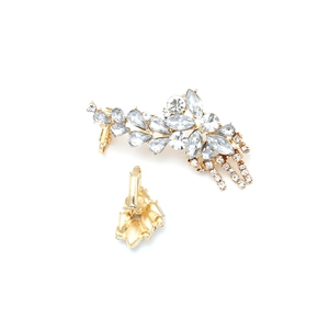 Exaggerated gold-tone floral tassel earrings with rhinestone crystals in a front and back view