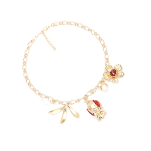 Baroque gold necklace with pomegranate pendant, red crystals, and pearls in vintage style