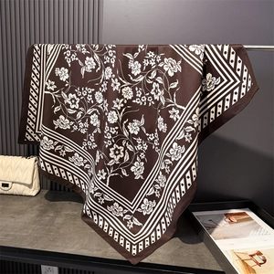 Elegant dark brown silk-like square scarf with white floral and geometric print