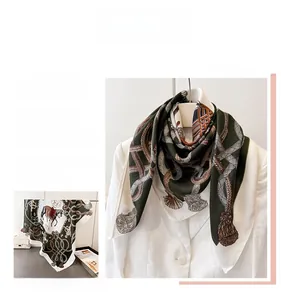 Close-up of elegant silk square scarf with vintage equestrian horse harness pattern