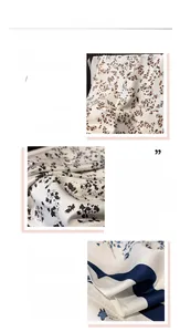 Detail view of floral twill silk scarf showing delicate print and fine rolled edges