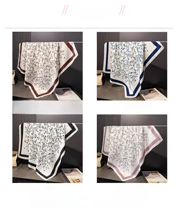 Floral satin scarves in coffee, blue, black, and pink colors displayed in a grid
