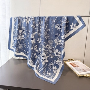 Elegant floral faux silk square scarf in Morandi blue with white border and lily print