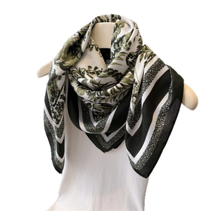 French jungle style silk square scarf with floral prints and elegant green leaf patterns