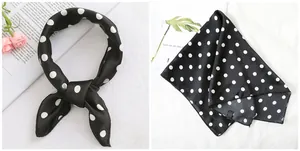 Detail of silk satin square scarf with classic black and white polka dots and soft luster