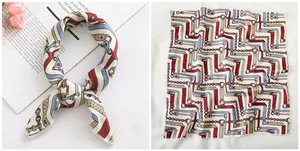 Detail of 50x50cm satin silk scarf with vintage chain print and elegant knot display