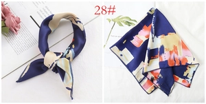 Detail of square satin scarf with abstract oil painting print in navy and beige