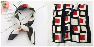 Detail showing red and navy geometric square patterns on a 50cm satin silk neck scarf