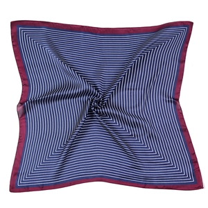 Detailed view of square silk scarf with navy stripes and elegant burgundy border