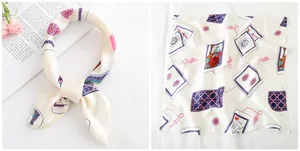 Detail of silk satin square scarf with tarot sun print and elegant styling display