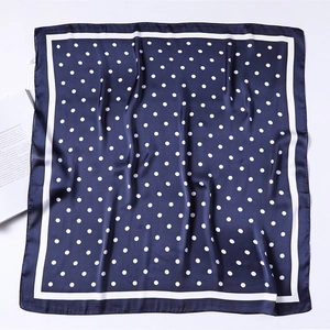 Elegant navy blue polka dot satin square scarf for women shown on a white background