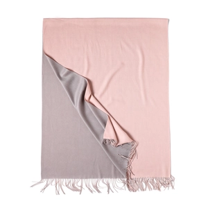 Close-up of pink and grey reversible cashmere-like scarf with delicate fringed edges