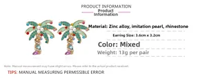 Detail view of coconut tree earrings with colorful crystals and pearls on white background