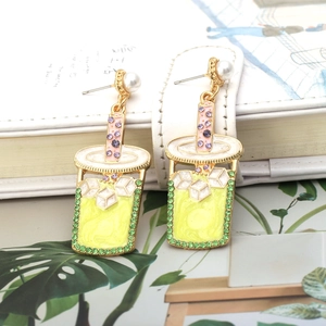 Creative bubble tea earrings with enamel and rhinestones for women on white background