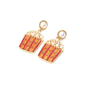 Creative popcorn drop earrings with white pearls and red crystal stripes on gold base