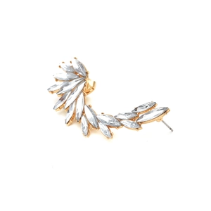 Detail of gold-plated wing ear cuff featuring sparkling marquise-cut crystal embellishments