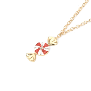 Golden necklace featuring a cute candy-shaped pendant with red and white sparkling crystals