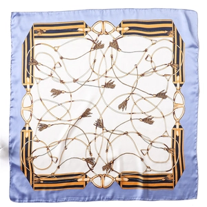 Detail of silk square scarf with horse bridle pattern and elegant lavender border