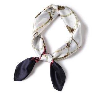 Elegant silk satin scarf with vintage gold chain and rope print on white background