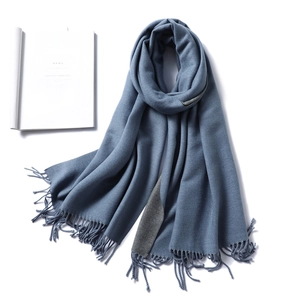 Close-up of Morandi blue and grey double-sided scarf with twisted tassel edge