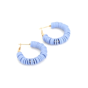 Detail of bohemian hoop earrings with light blue polymer clay heishi beads and gold hooks