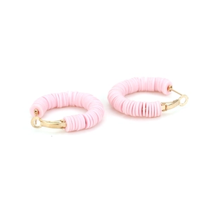 Detail of bohemian pink clay bead hoop earrings with elegant gold plated hardware