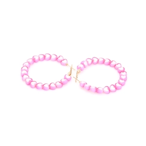 Pink heart-shaped pearl bead hoop earrings with elegant gold-tone metal frames