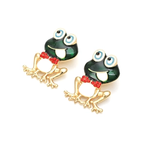Funny green enamel frog earrings with red rhinestone bowties on white background