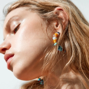 Bohemian colorful glass bead C-shaped hoop earrings and matching necklace set on model