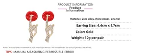 Detailed view of red lip stud earrings with white rhinestones and size specifications