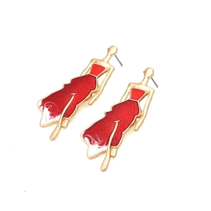 Artistic gold earrings featuring elegant abstract lady figures in red glitter enamel