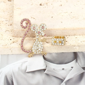 Asymmetric gold alloy mouse and cheese stud earrings with pink and yellow rhinestones