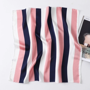 Detail of navy blue, pink, and white vertical striped silk scarf with fine edge stitching