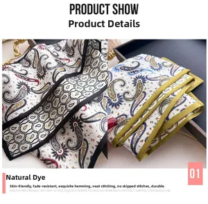 Gros plan d'un foulard en soie à motif paisley montrant des coutures de bord soignées