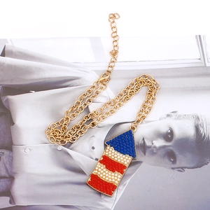 Golden alloy chain necklace with a colorful rocket pendant inlaid with red and blue beads