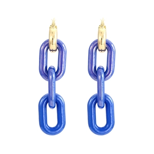 Close-up of long chain drop earrings with gold metal rings and blue resin links