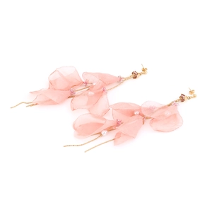 Long pink chiffon petal tassel earrings with gold chains and pearls on white background