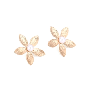 Retro golden floral earrings with textured metal petals and central pearls for women