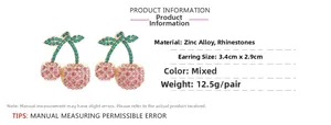 Detailed spec view of cherry earrings with pink and green rhinestones in zinc alloy
