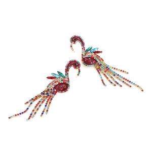 Dramatic gold flamingo drop earrings with colorful rhinestone tassels and crystal inlay