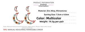 Detail showing zinc alloy rainbow moon earrings with rhinestones measuring 7.3x4.0cm