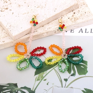 Colorful handmade woven glass crystal flower drop earrings with mixed beaded details