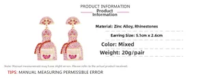 Detailed view of pink rhinestone tequila bottle earrings showing 5.1cm length dimensions