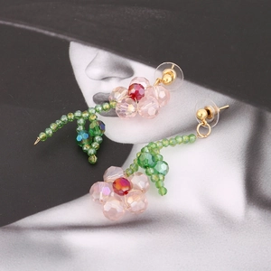 Sweet asymmetric floral crystal beaded drop earrings with pink petals and green leaves