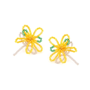 Detailed close-up of handmade beaded flower earrings in yellow and green glass seed beads