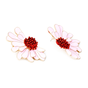 Detail of pink enamel daisy earrings with red beaded center and gold plating