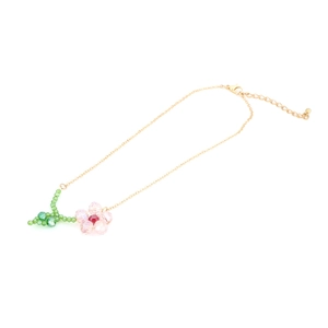 Handmade beaded flower pendant necklace with pink crystal petals and gold-tone chain