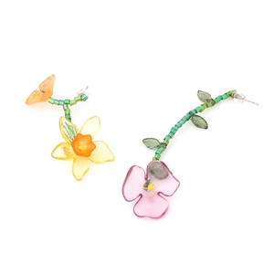 Asymmetric handmade beaded floral drop earrings with colorful resin petals and green stems
