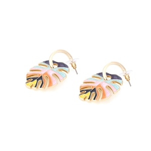 Detail shot of colorful enamel monstera leaf earrings with gold-tone alloy frame